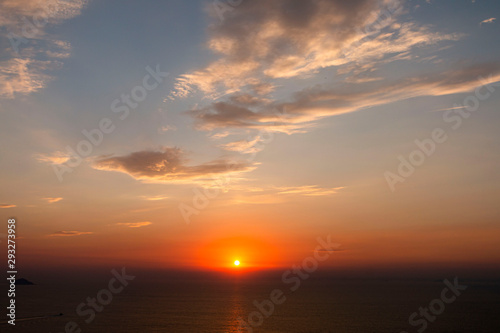 Romantic Natural Sunset Sunrise Over Field Or Meadow. Bright Dramatic Sky And Dark Ground. Countryside Landscape Under Scenic Colorful Sky At Sunset Dawn Sunrise. Sun Over Skyline, Horizon © stocktr