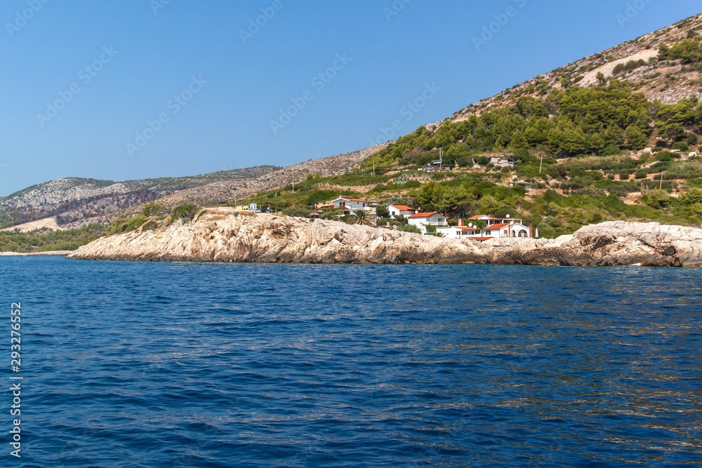 View of the bay Velo Zarace - island Hvar. Sailing on the Adriatic Sea. Holiday in Croatia. View from sailboat.