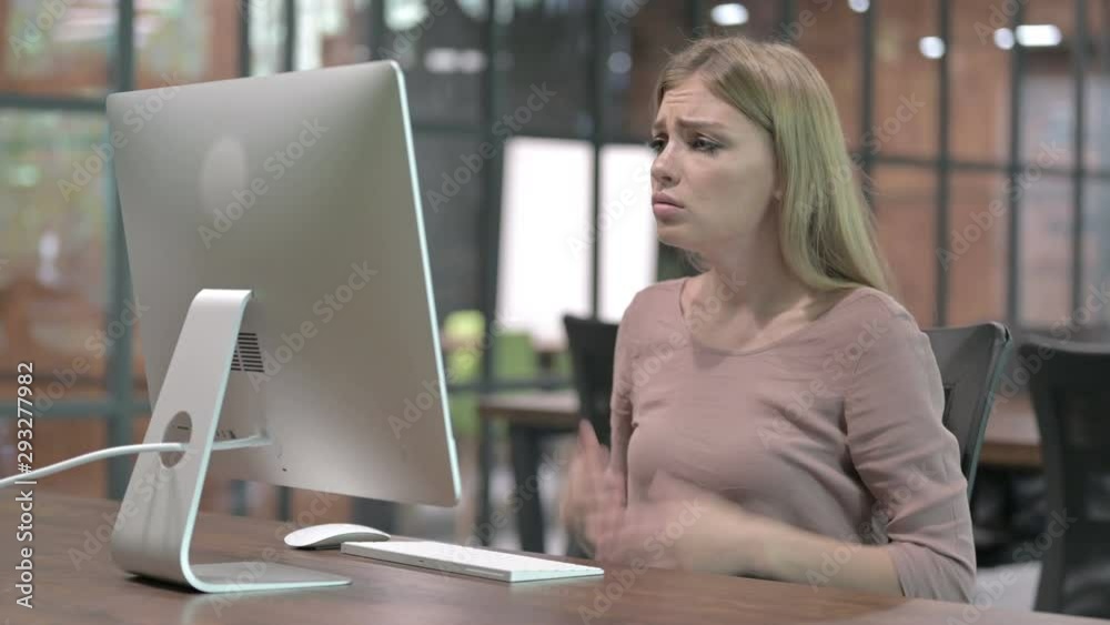 Focus Woman getting Upset while Working on Computer Focus Woman getting Upset while Working on Computer