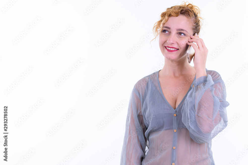 Portrait of happy beautiful blonde woman talking on the phone and ready to party Portrait of happy beautiful blonde woman talking on the phone and ready to party