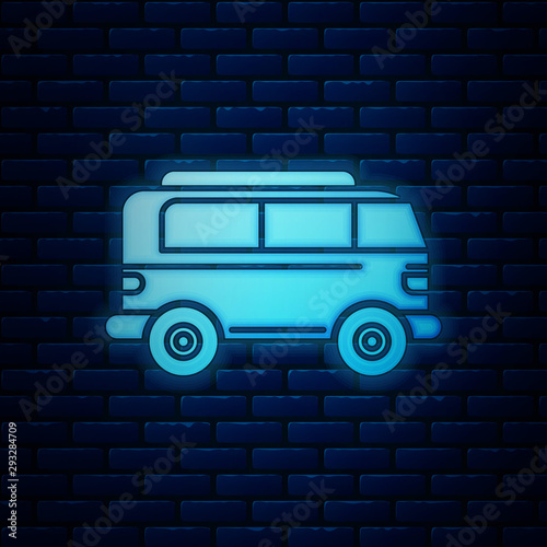 Glowing neon Retro minivan icon isolated on brick wall background. Old retro classic traveling van. Vector Illustration