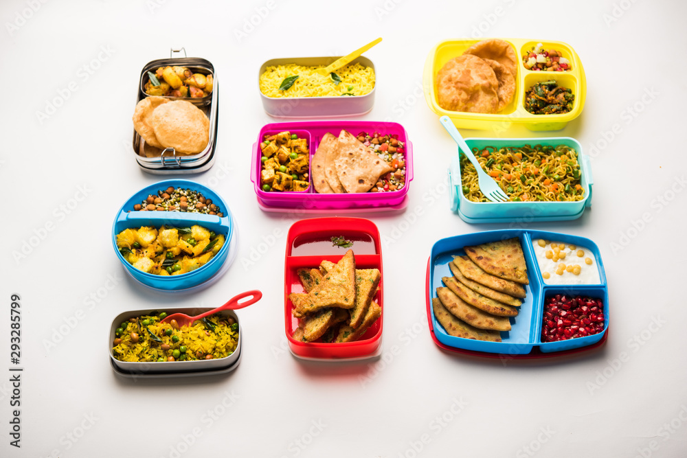 group of Lunch Box / Tiffin for Indian kids, showing variety or multiple option or combination of healthy food for your school going children group of Lunch Box / Tiffin for Indian kids, showing variety or multiple option or combination of healthy food for your school going children