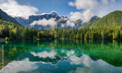 Fototapeta Naklejka Na Ścianę i Meble -  beautiful sunny morning on an alpine lake in the Julian Alps in Italy