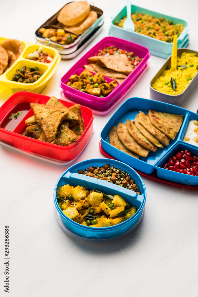 group of Lunch Box / Tiffin for Indian kids, showing variety or multiple option or combination of healthy food for your school going children