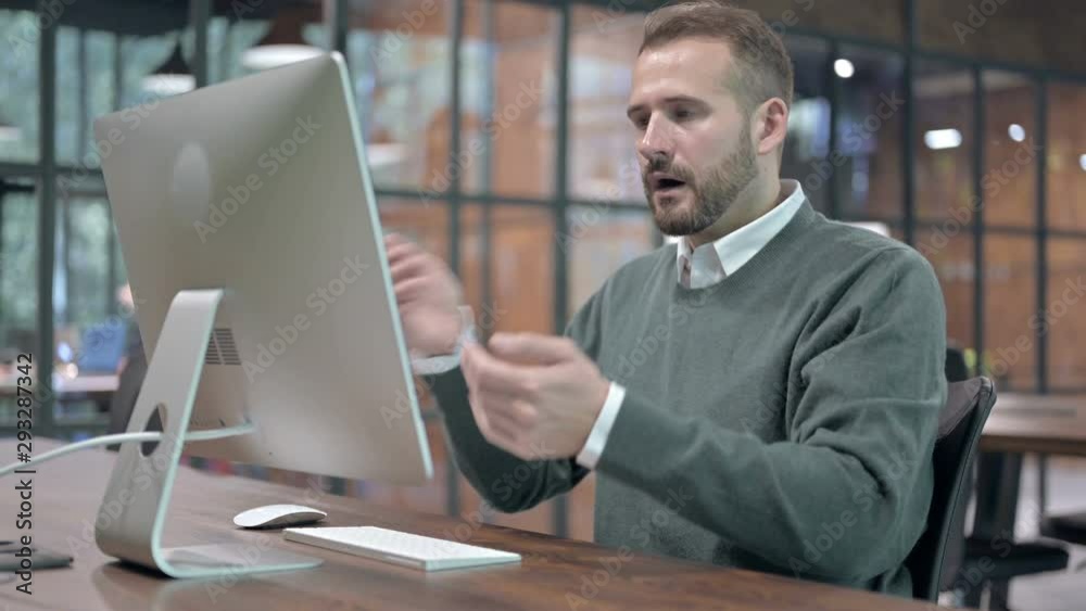 Stressed Man get Shocked while Working on Computer Stressed Man get Shocked while Working on Computer