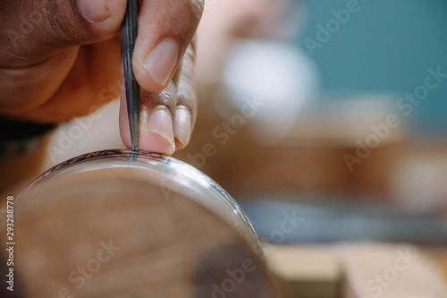 The process of making a nielloware.