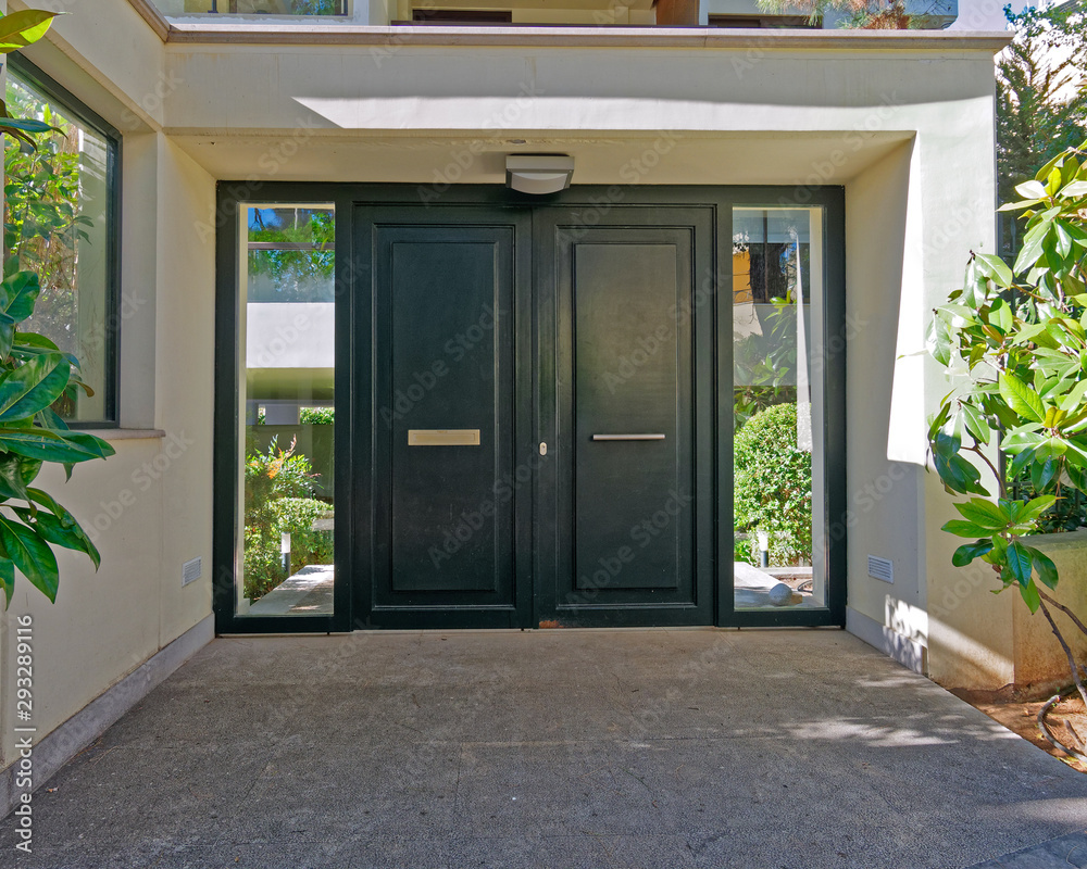 elegant apartment building entrance green metallic door, Athens Greece elegant apartment building entrance green metallic door, Athens Greece