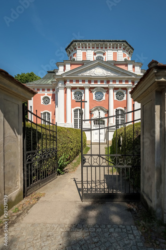 Eingangsportal zur denkmalgeschützten Schlosskirche Berlin-Buch - Im Gibelfeld der hebräische Gottesname JHWH photo