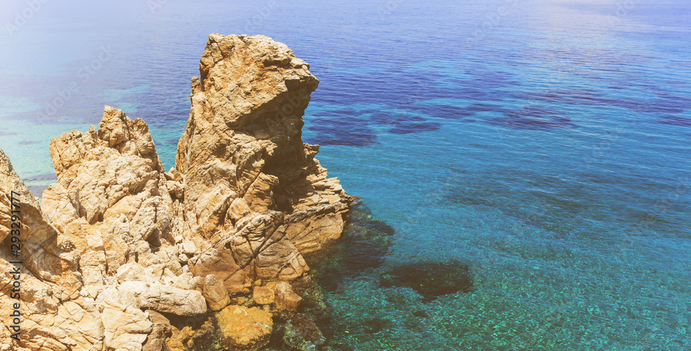 scenic rocks formations and beautiful seascape on summer day