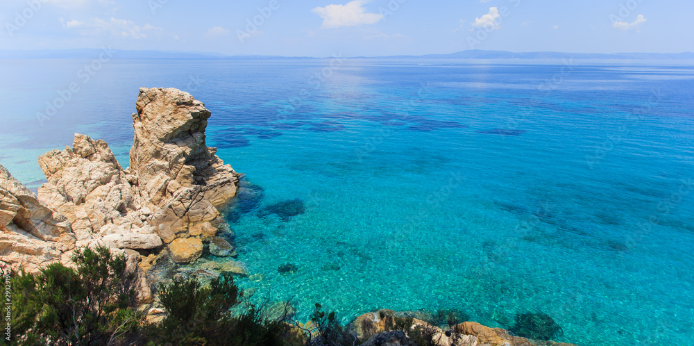 scenic rocks formations and beautiful seascape on summer day