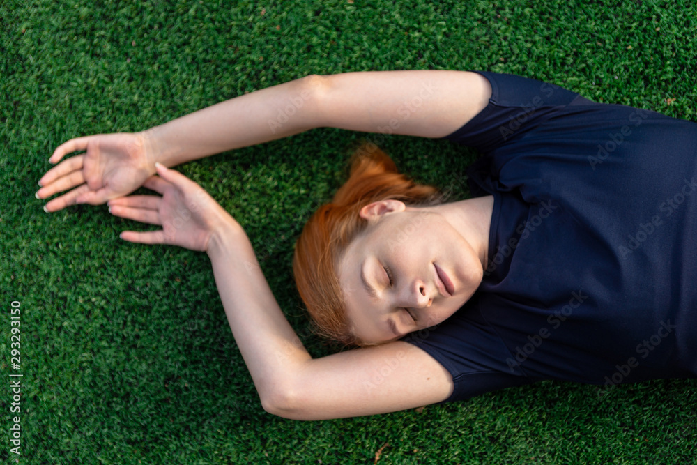 Top view of a young woman on the ground Top view of a young woman on the ground