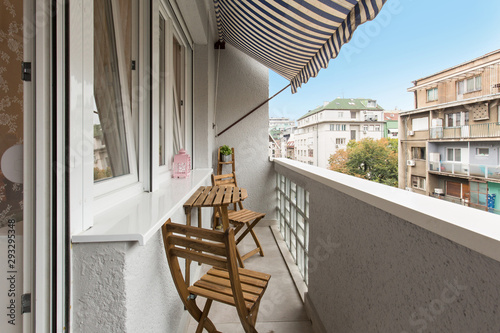 Fotomurale Small building apartment balcony with a view