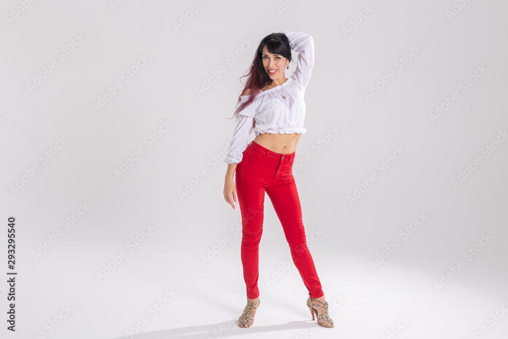 Latino dance, Improvisation, contemporary and vogue dance concept - young beautiful woman dancing on white studio background
