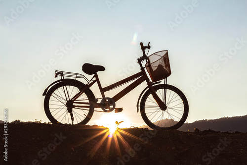 bike on the mountain sunset background