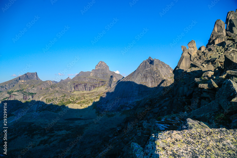 mountain view with rocks and blue sky 