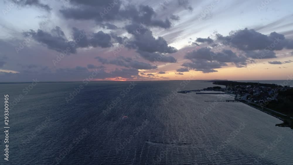Silhouette Of A Man On A Kite-Board In The Sea At Sunset, Aerial View