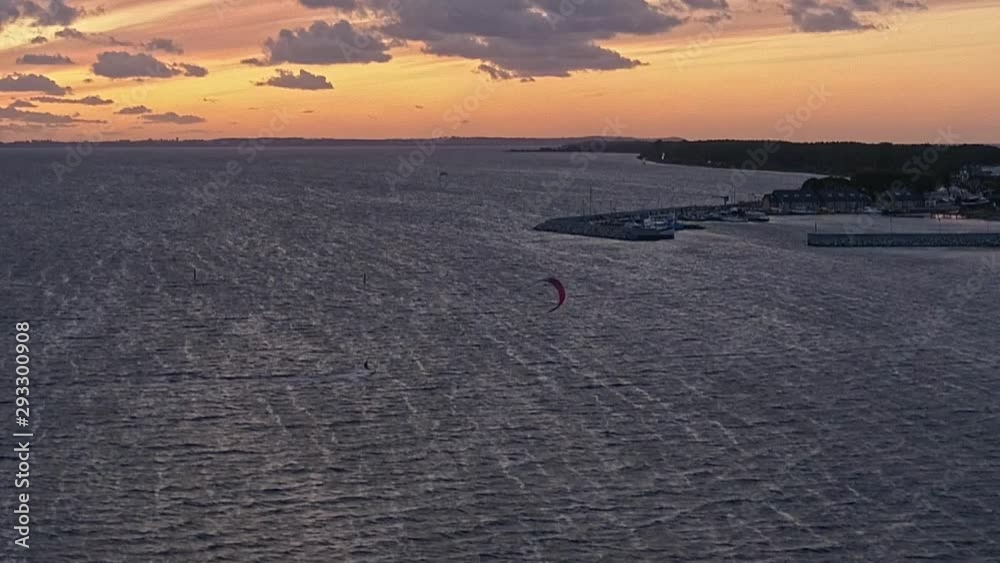 Silhouette Of A Man On A Kite-Board In The Sea At Sunset, Aerial View