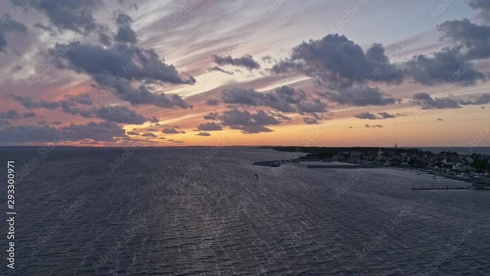Silhouette Of A Man On A Kite-Board In The Sea At Sunset, Aerial View