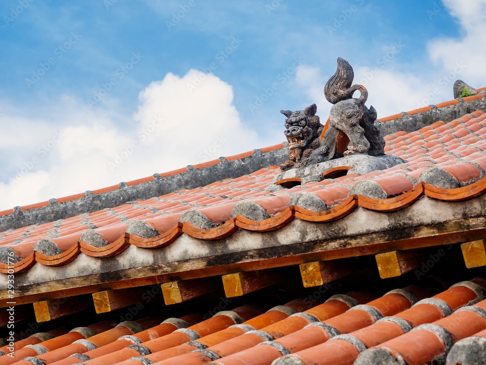 Fototapeta OKINAWA Lion on Ryukyu architecture Roof Art Okinawa island Japan