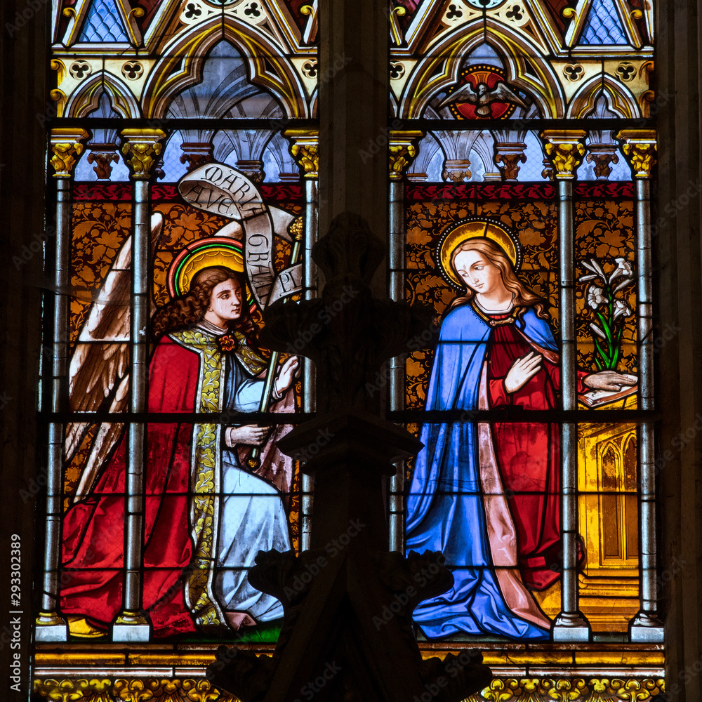  Annunciation - Stained glass window at the Collegiale church of Saint Emilion, France