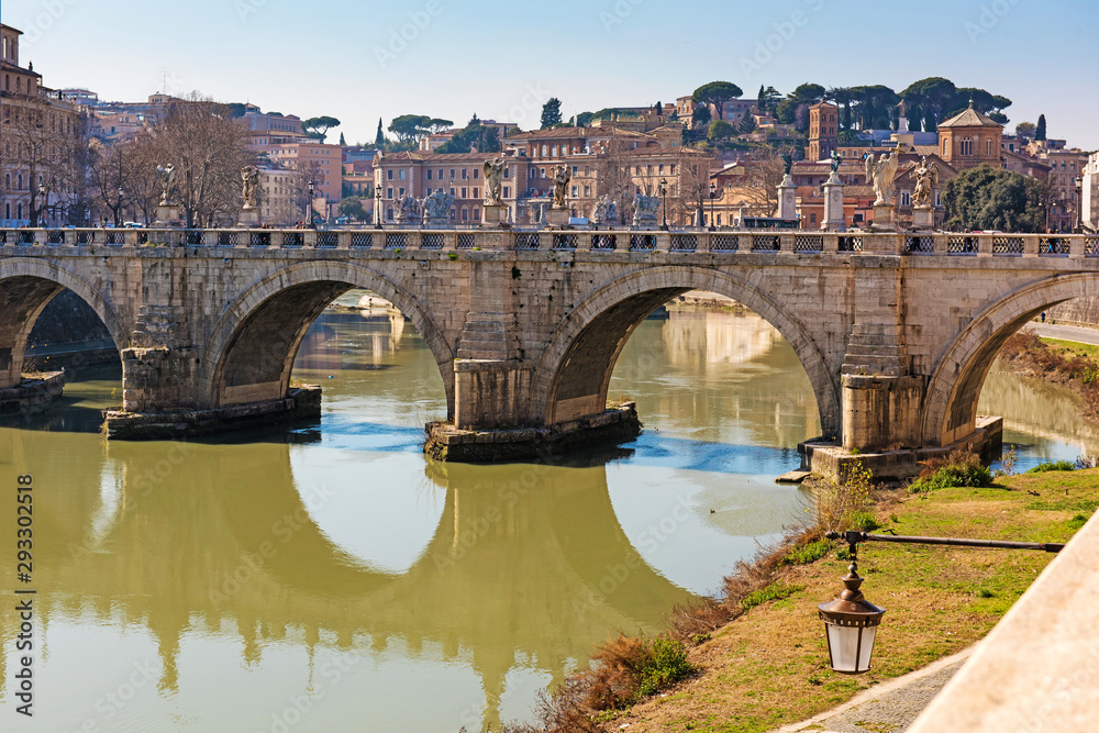 Naklejka premium Rome, Italy, February 20, 2017 - view of Rome, Italy. Tiber River with bridges in Rome. Beautiful scenic panorama of Rome city.