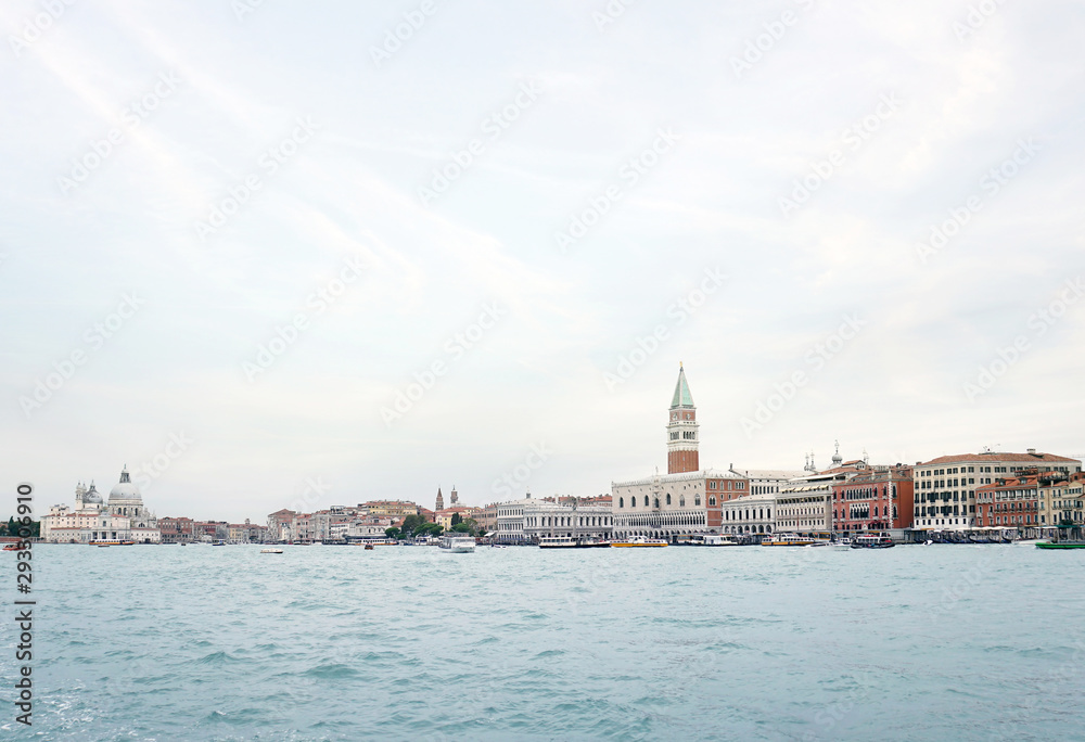 View of the Venice promenade and the Campanile of St. Mark Cathedral and the Doges Palace from the side of the Venetian lagoon