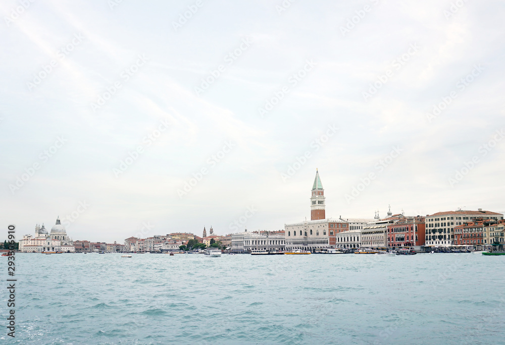 View of the Venice promenade and the Campanile of St. Mark Cathedral and the Doges Palace from the side of the Venetian lagoon View of the Venice promenade and the Campanile of St. Mark Cathedral and the Doges Palace from the side of the Venetian lagoon