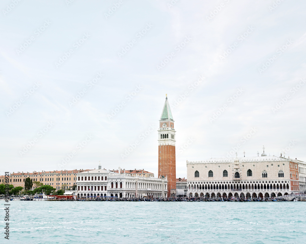 View of the Venice embankment and the Campanile of St. Mark Cathedral and the Doges Palace from the side of the Venetian lagoon