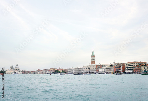 View of the Venice promenade and the Campanile of St. Mark Cathedral and the Doges Palace from the side of the Venetian lagoon