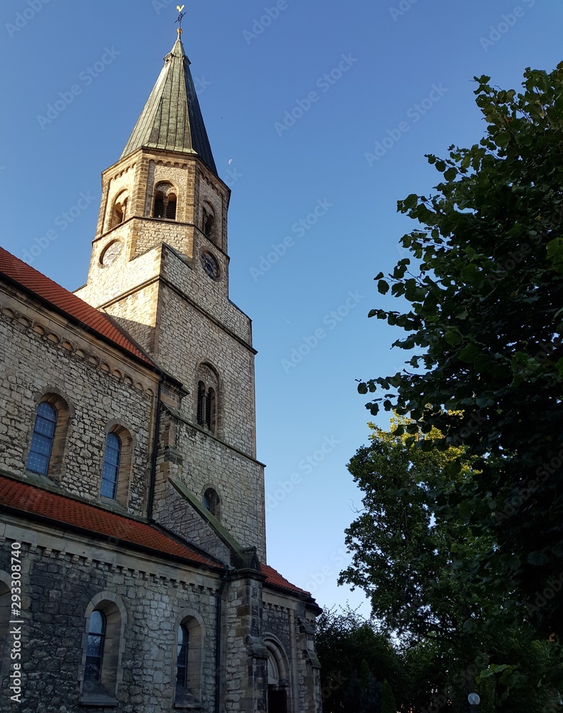 church architecture, tower, religion, building, old, sky, europe, cathedral, blue, city, cross, landmark, catholic, religious, germany, town, monument, gothic, stone, historical, steeple