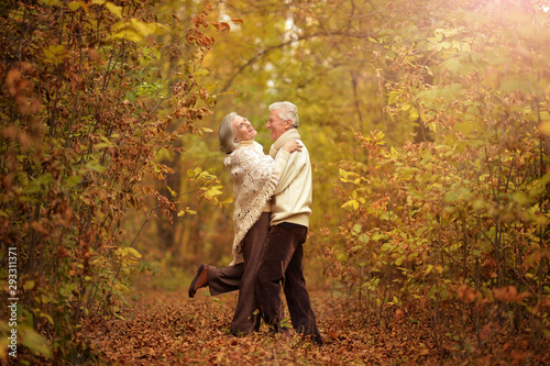 Portrait of happy senior woman and man