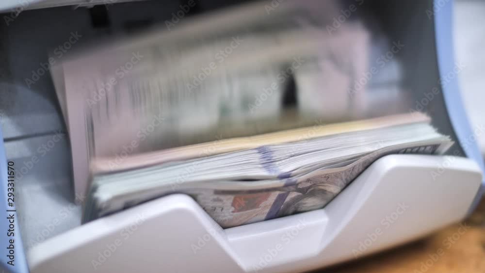 Automatic money counting machine close up
