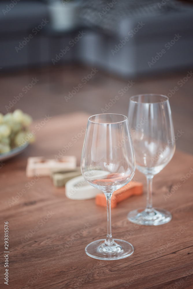 Two wine glasses on the wood table Two wine glasses on the wood table
