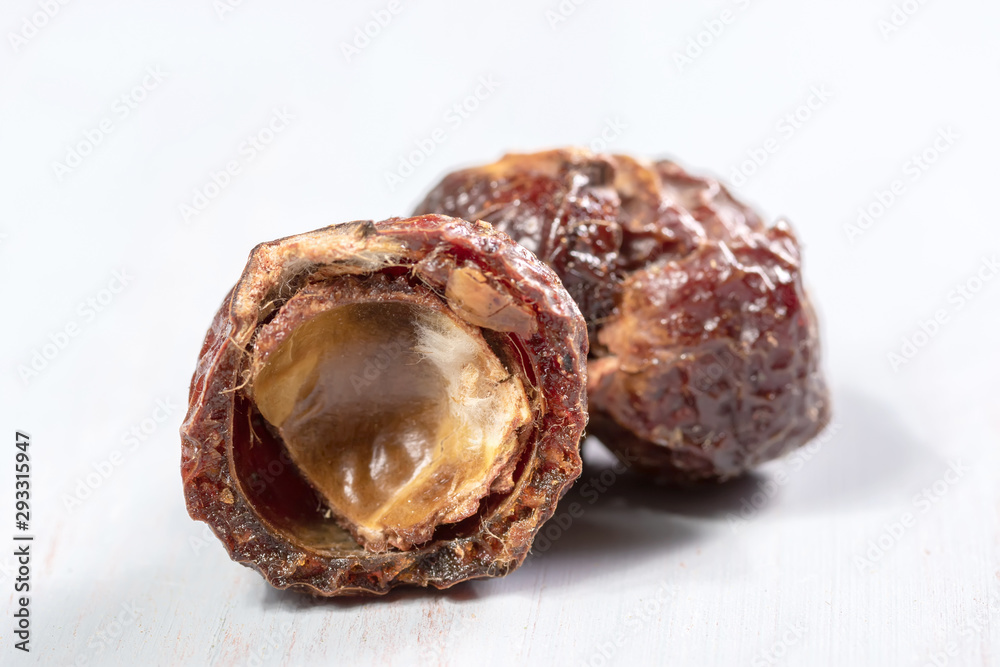 soap nut closeup on a wooden table soap nut closeup on a wooden table