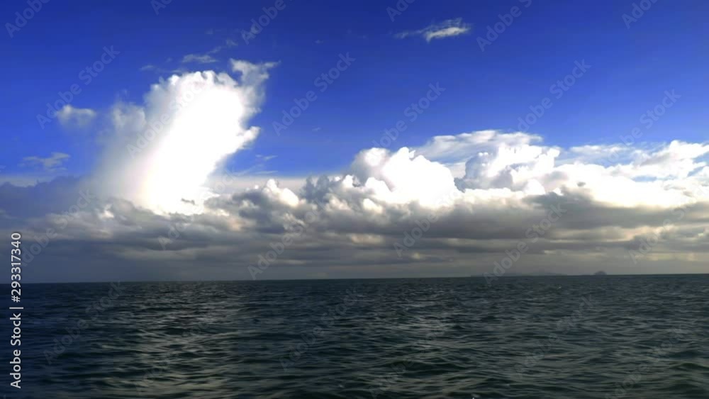 Looking at the sea and sky on the boat in Krabi. (Slow Motion - Angle 003) Looking at the sea and sky on the boat in Krabi. (Slow Motion - Angle 003)