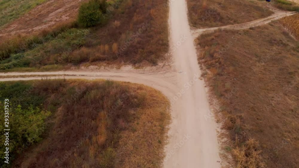 Paved road on an embankment on the rural place by the Danube River.
