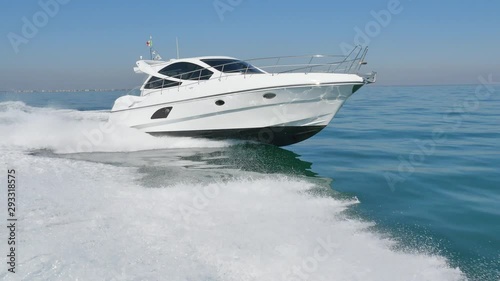 fast motor yacht in navigation photo