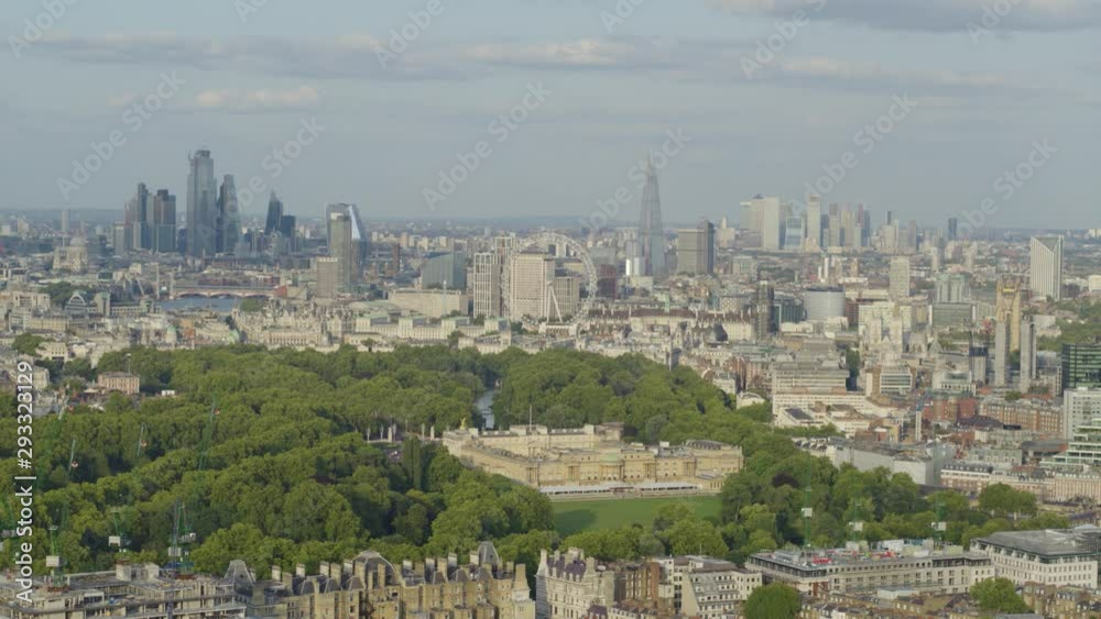 Aerial establishing shot of central london featuring Buckingham palace