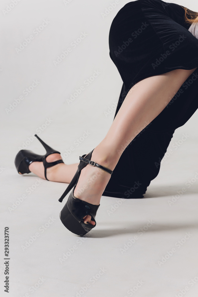 overvælde måle Arbejdskraft Close up shoes for pole dance with high heels on legs. Stock-foto | Adobe  Stock