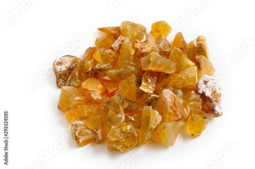 Yellow opal gemstone, natural mineral jewelry, rough raw specimen common opal on white background