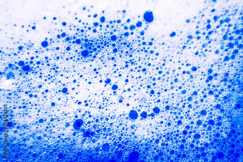 Beautiful abstract texture color white and blue bubbles background in water on blue background pattern clear soapy shiny Beautiful abstract texture color white and blue bubbles background in water on blue background pattern clear soapy shiny