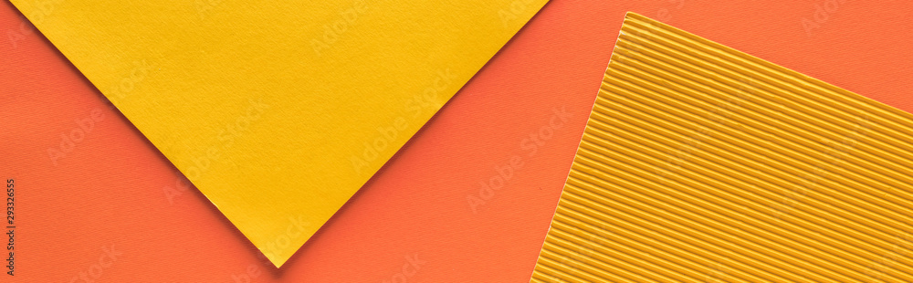Fototapeta premium top view of yellow and orange background with copy space, panoramic shot