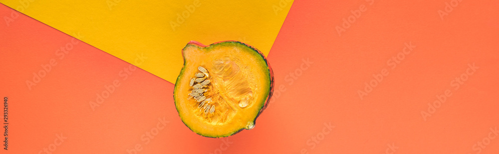 top view of pumpkin on yellow and orange background with copy space, panoramic shot top view of pumpkin on yellow and orange background with copy space, panoramic shot