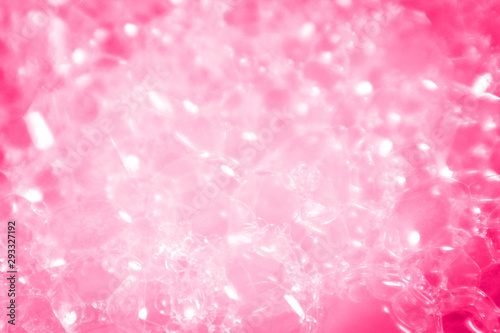 Beautiful abstract texture color white and pink bubbles background in water on pink background pattern clear soapy shiny