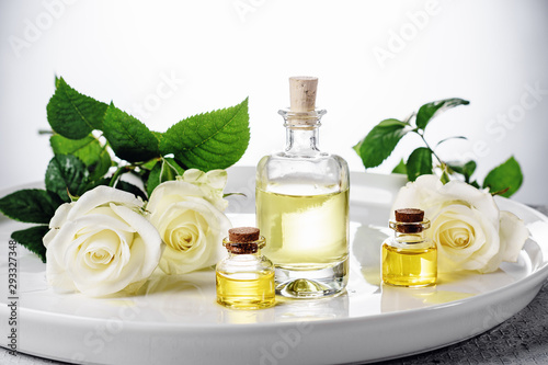 Cosmetic rose oil in bottles.