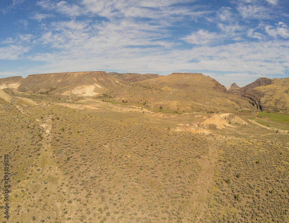 Sensational aerial picturesque images of the John Day Fossil Beds Overlook and valley of Grant County in Dayville, Oregon Sensational aerial picturesque images of the John Day Fossil Beds Overlook and valley of Grant County in Dayville, Oregon