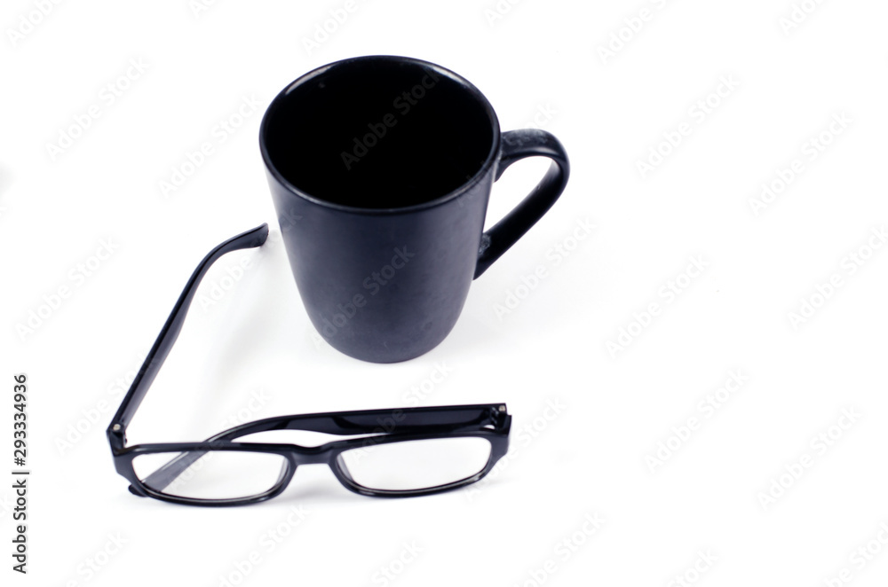Minimalist style with coffee cups and eyeglasses on white backgrounds Minimalist style with coffee cups and eyeglasses on white backgrounds