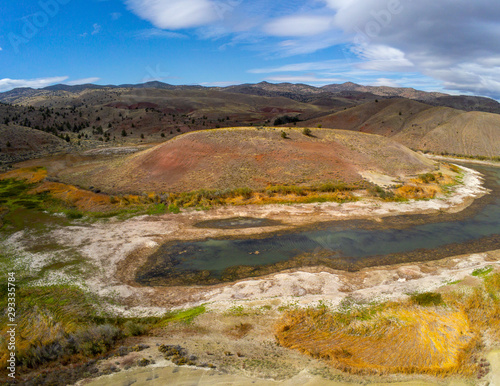 Audacious aerial Photography of the vibrant and photogenic John Day Fossil Beds and the iridescent Painted Hills Reservoir of Wheeler County in Mitchell, Oregon