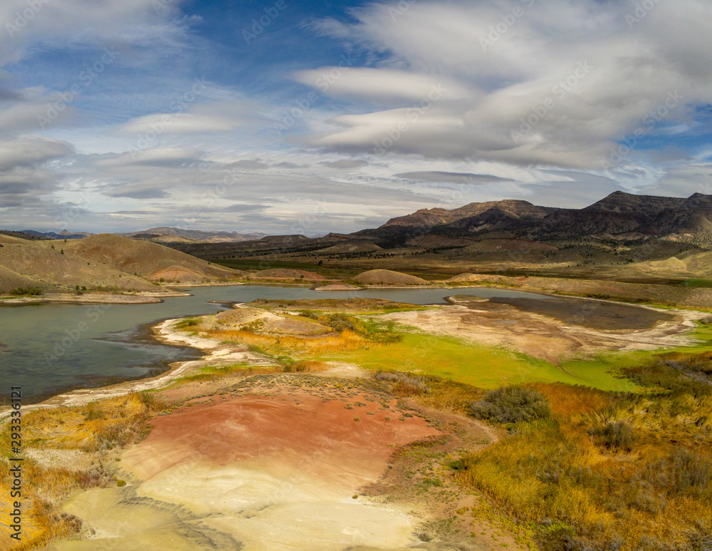 Audacious aerial Photography of the vibrant and  photogenic John Day Fossil Beds and the iridescent Painted Hills Reservoir of Wheeler County in Mitchell, Oregon