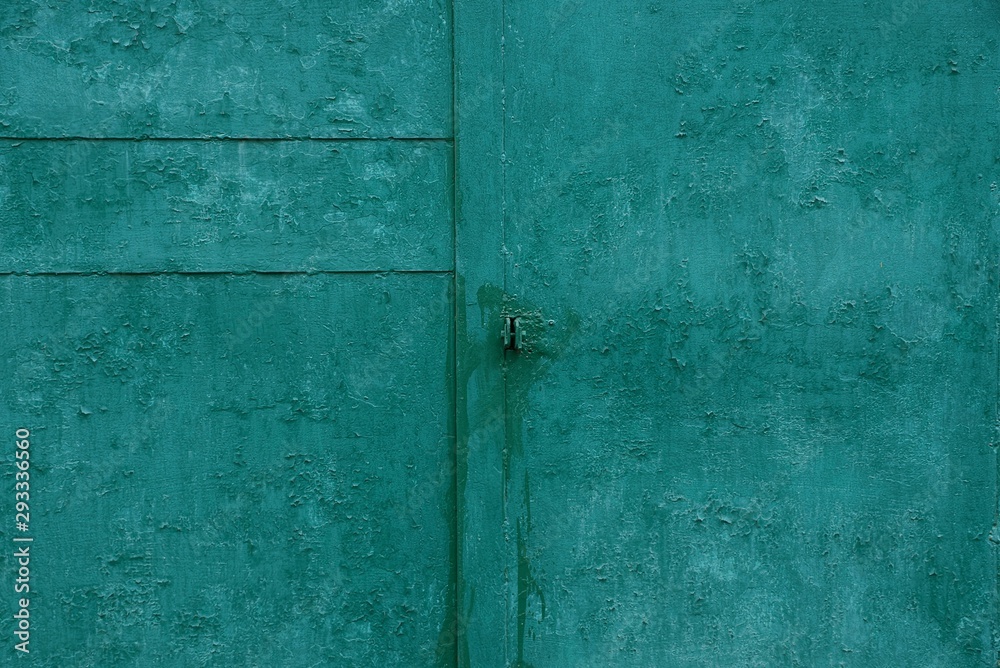 green metal background of old iron wall and seam green metal background of old iron wall and seam